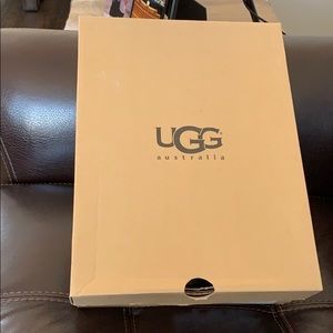 Ugg size 7 brand new (never worn) in box brown